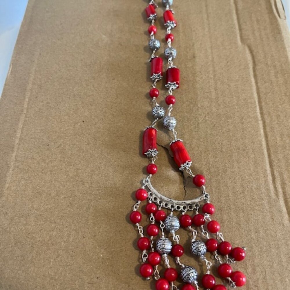 Red coral and sterling silver beaded statement necklace.